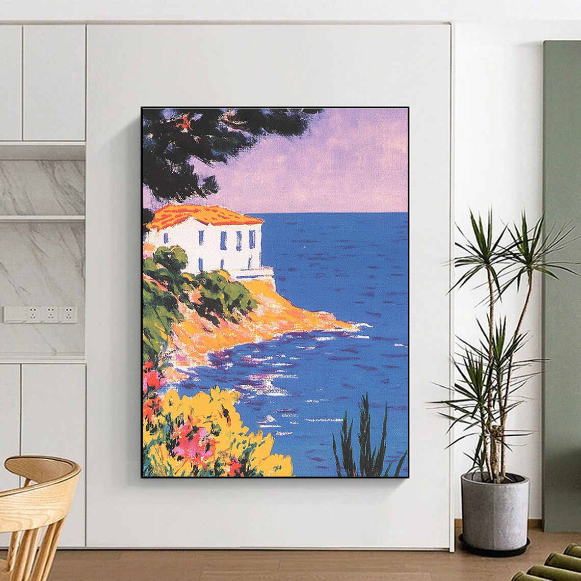 A large abstract painting featuring a vintage postcard of the Mediterranean coast with pastel colors and a stunning purple-blue sky.STSC1228