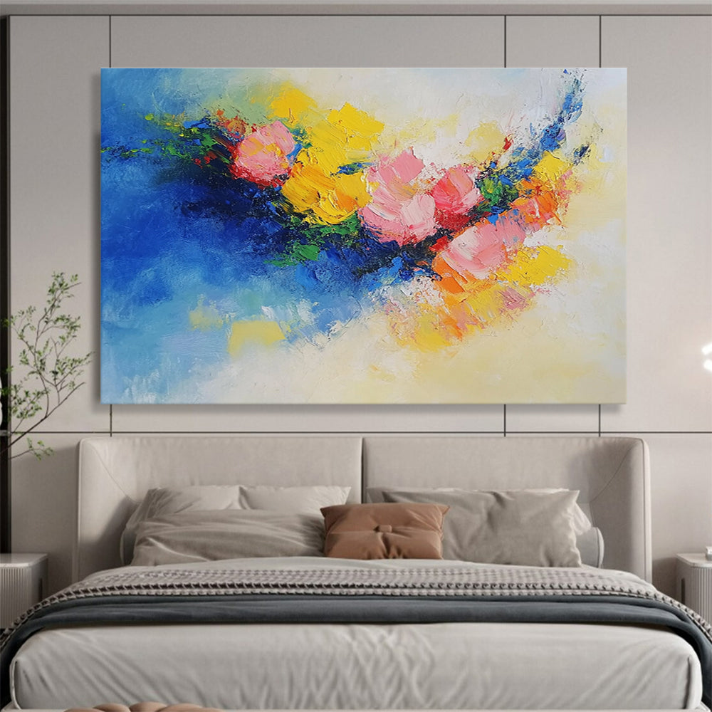 Large abstract painting of flowers in vibrant yellow, blue, and pink featuring textured palette knife techniques. Perfect for modern decor.SC190