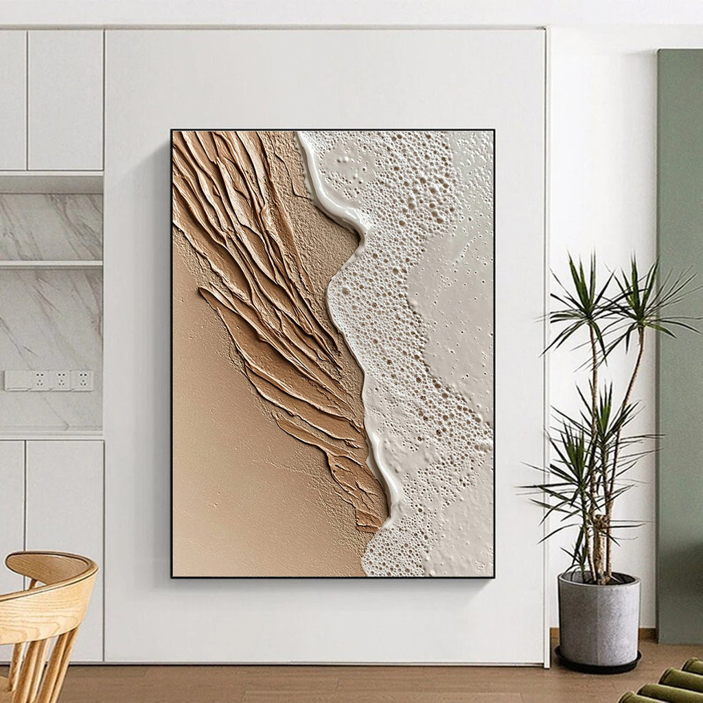An abstract painting capturing close-up sand and serene waves at sunset featuring intricate details and a soothing beige color scheme.STSC943