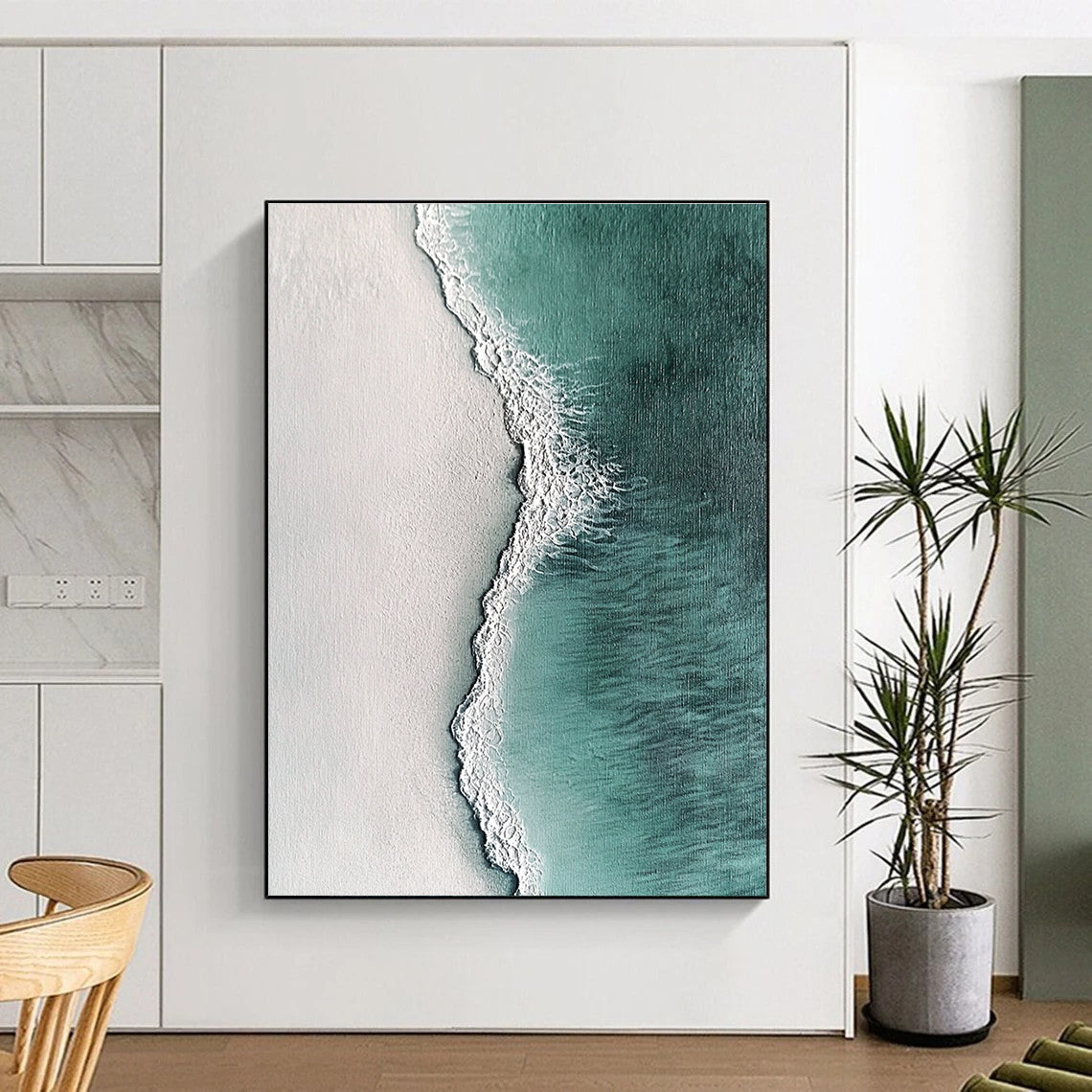 Large abstract painting featuring ocean waves and white sand in hyper-realistic textures with dark green light blue and light gray tones.STSC532