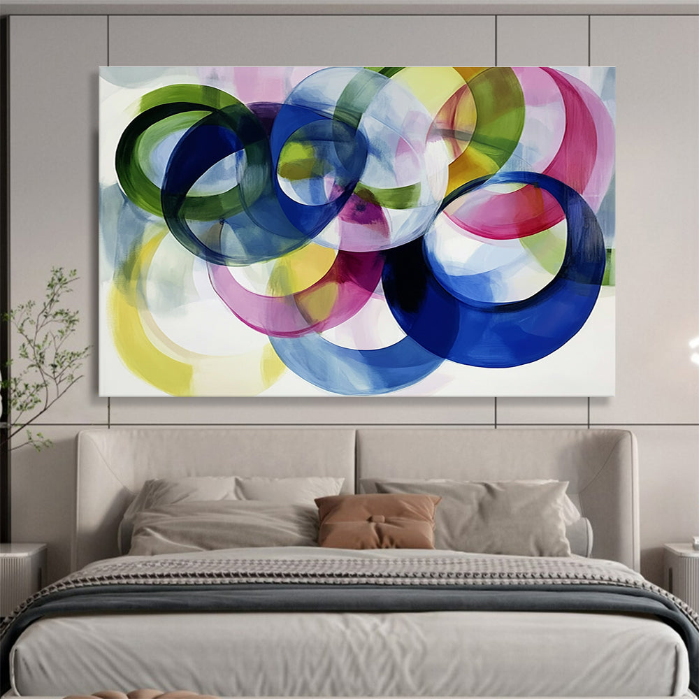 Large abstract painting with colorful overlapping circles on a white background showcasing joyful energy and playful modernity through soft edges and visible brushstrokes.SC525