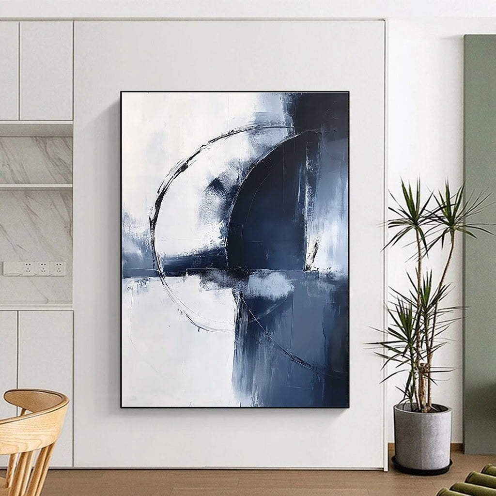 Large abstract painting in light navy and white tones featuring bold brushstrokes and an elegant minimalist style for sophisticated decor.STSC1355