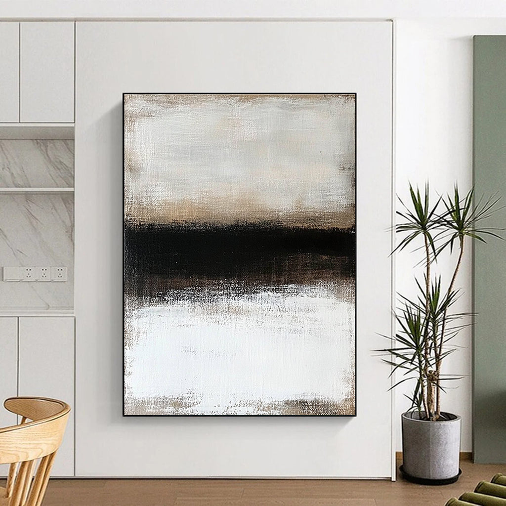 Large abstract painting featuring a textured surface of neutral colors depicting a snowy landscape enveloped in ethereal fog.STSC630