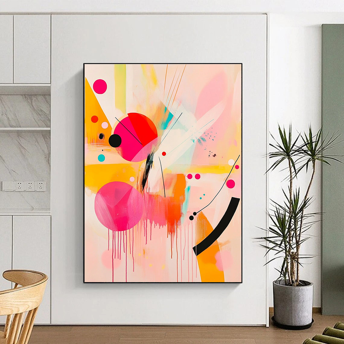 Large abstract painting featuring pink and yellow shapes with black lines and bright orange geometric forms creating a joyful playful composition.STSC790
