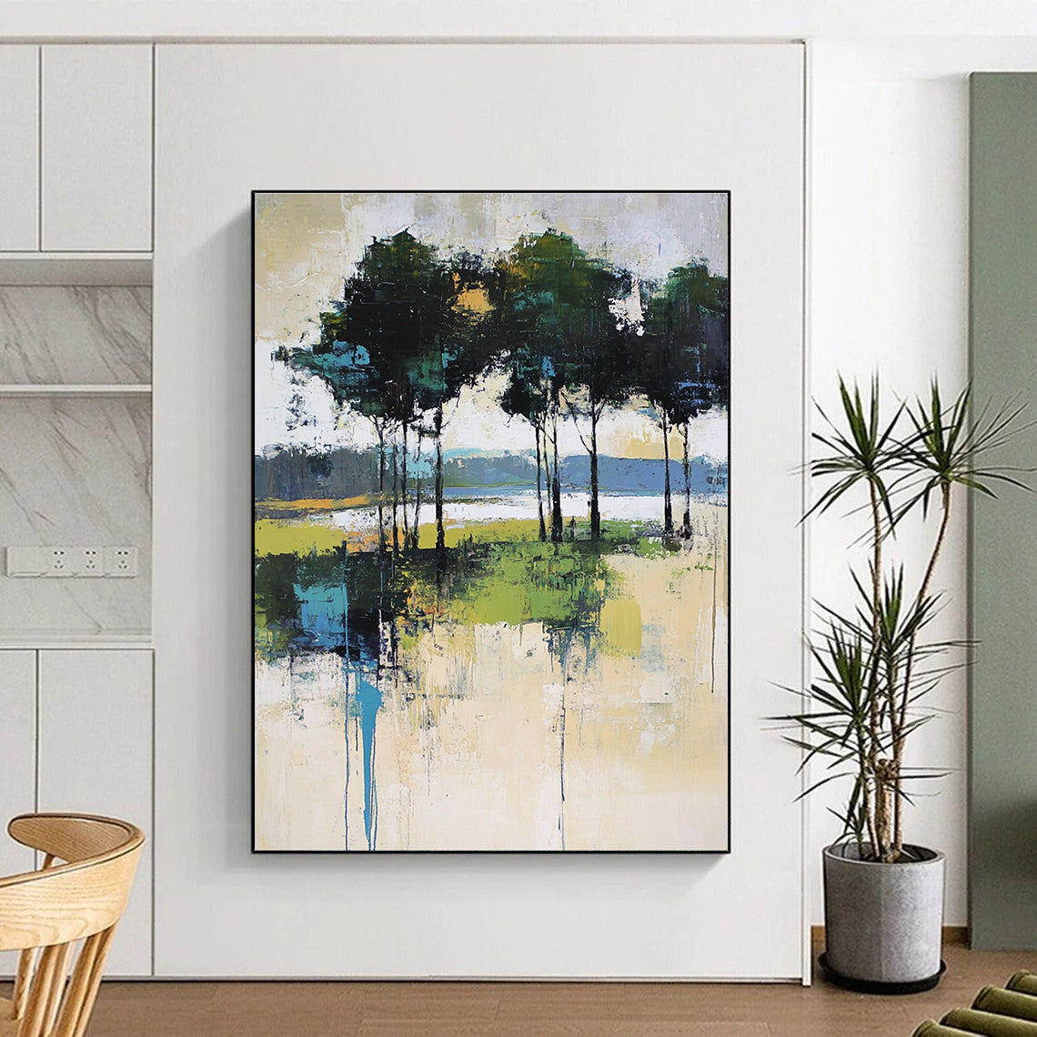 Large abstract painting featuring expressive brush strokes with trees and a lake in soft pale green and beige tones.STSC118