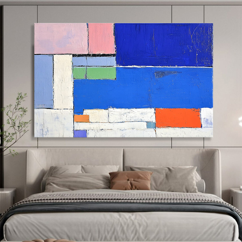 Large abstract painting featuring a vibrant blue sea white beach and colorful hotel with thick brush strokes and geometric shapes.SC169