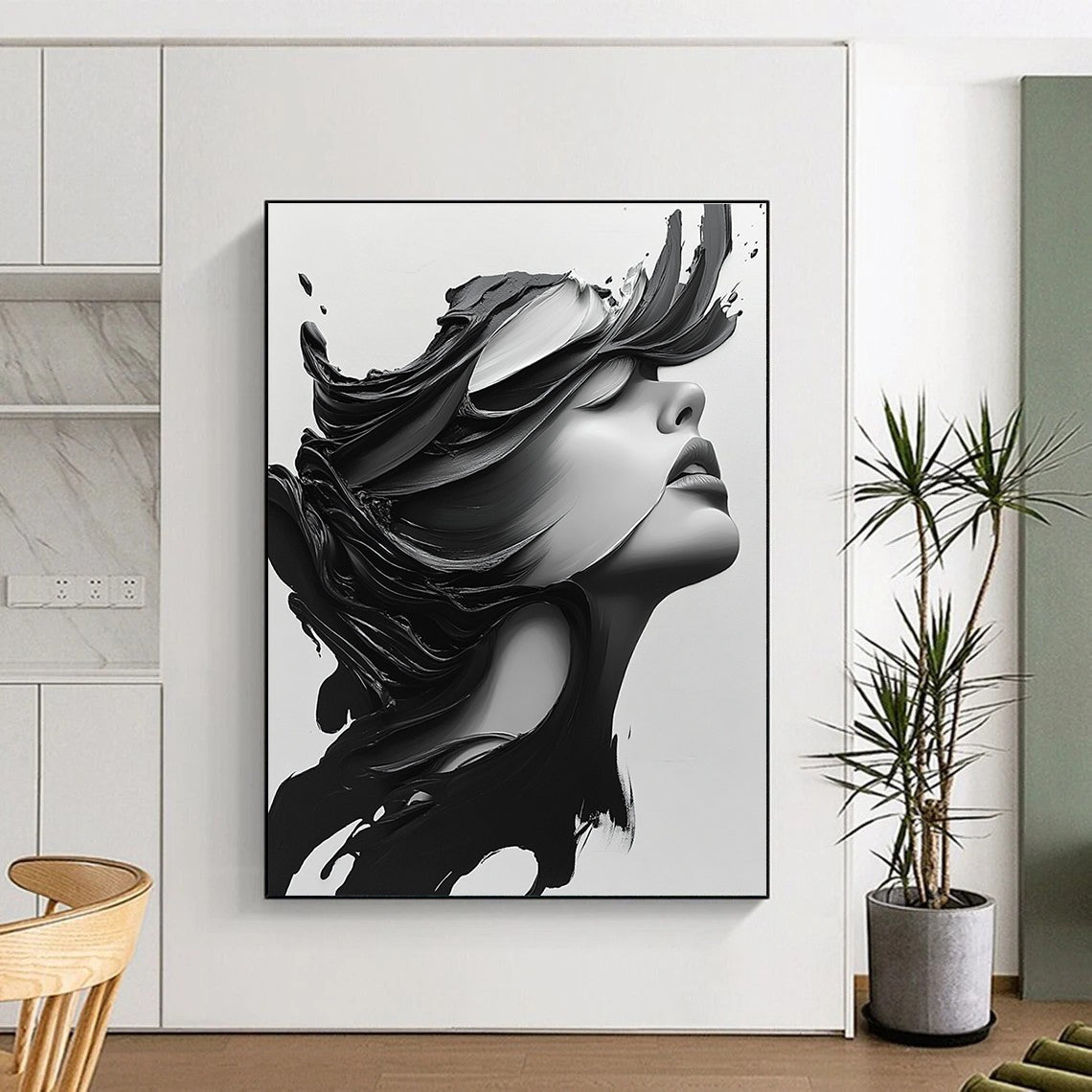 Large abstract painting featuring a close-up portrait of a beautiful woman with long hair blowing, in monochrome colors and dramatic contrast.STSC1469