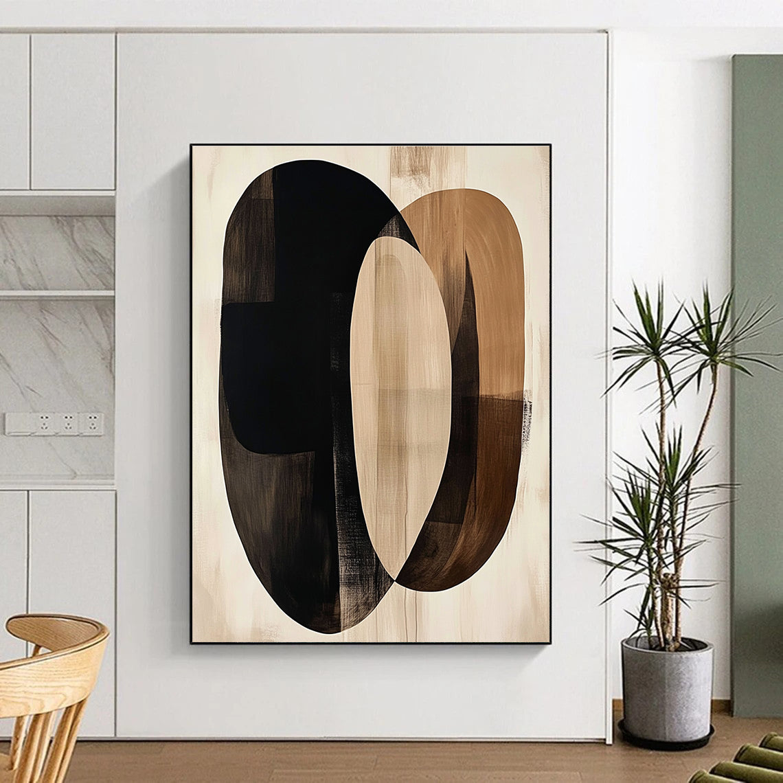 Large abstract artwork featuring fluid beige and black shapes with dark brown ovals on a cream background evokes tranquility through minimalist design.STSC470