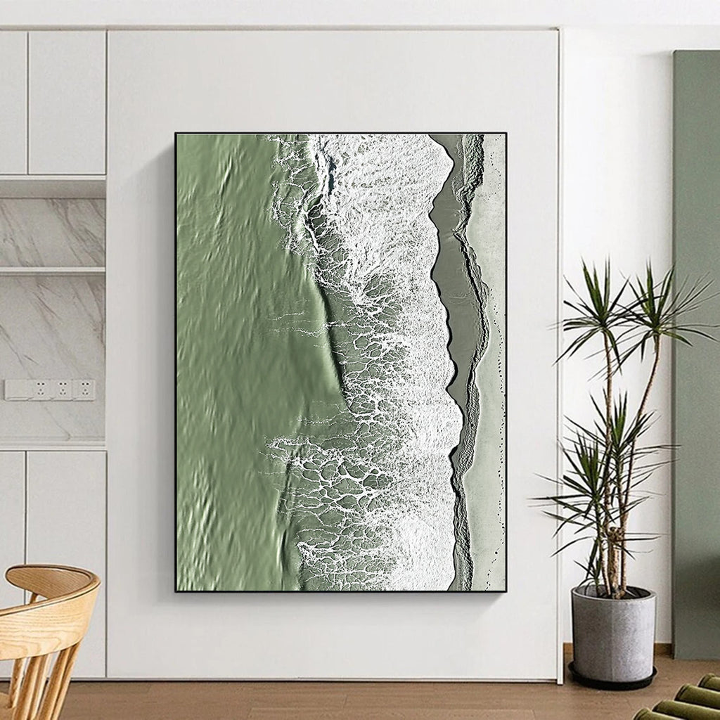 A large abstract painting capturing the serene edge where sand meets water in green and grey tones with rolling waves.STSC1158