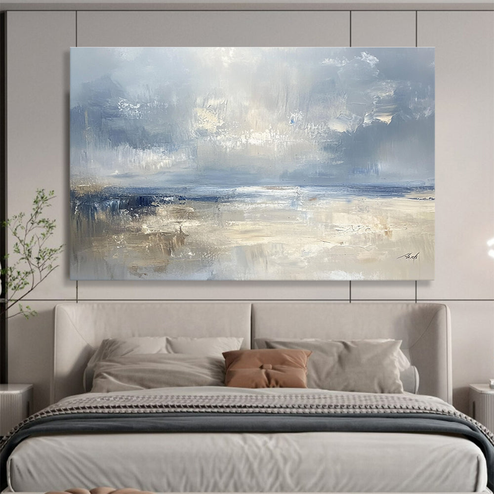 Large abstract seascape in cool blues and grays with warm beige accents capturing serene coastal beauty and a misty horizon.SC278