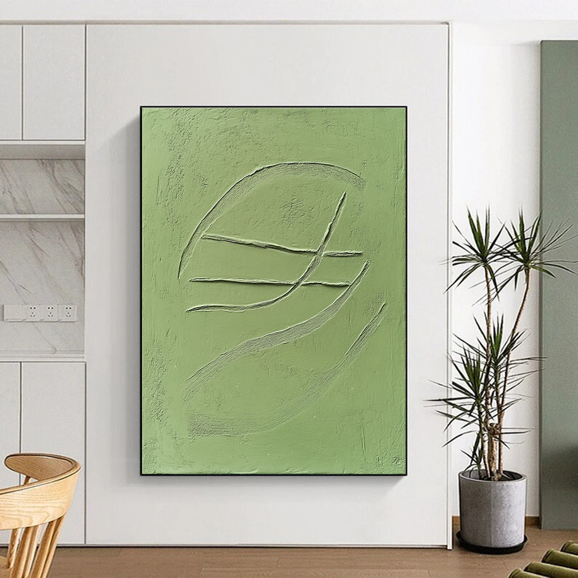 Abstract art featuring a smooth green clay tile with embossed three curved lines against a solid green background.STSC1010