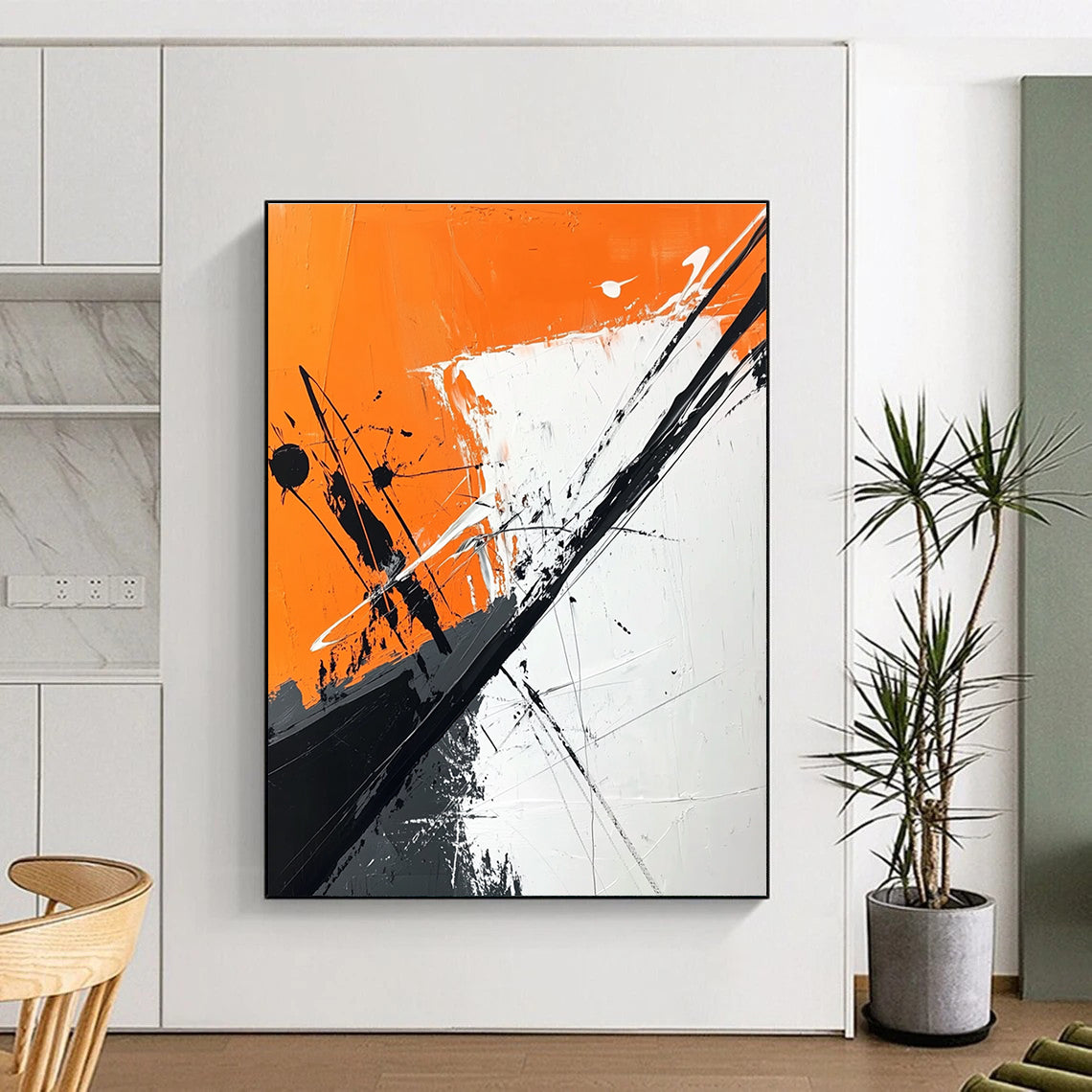 Large abstract painting features orange and white background with black brush strokes and dark gray diagonal line adding depth and artistic flair.STSC1118