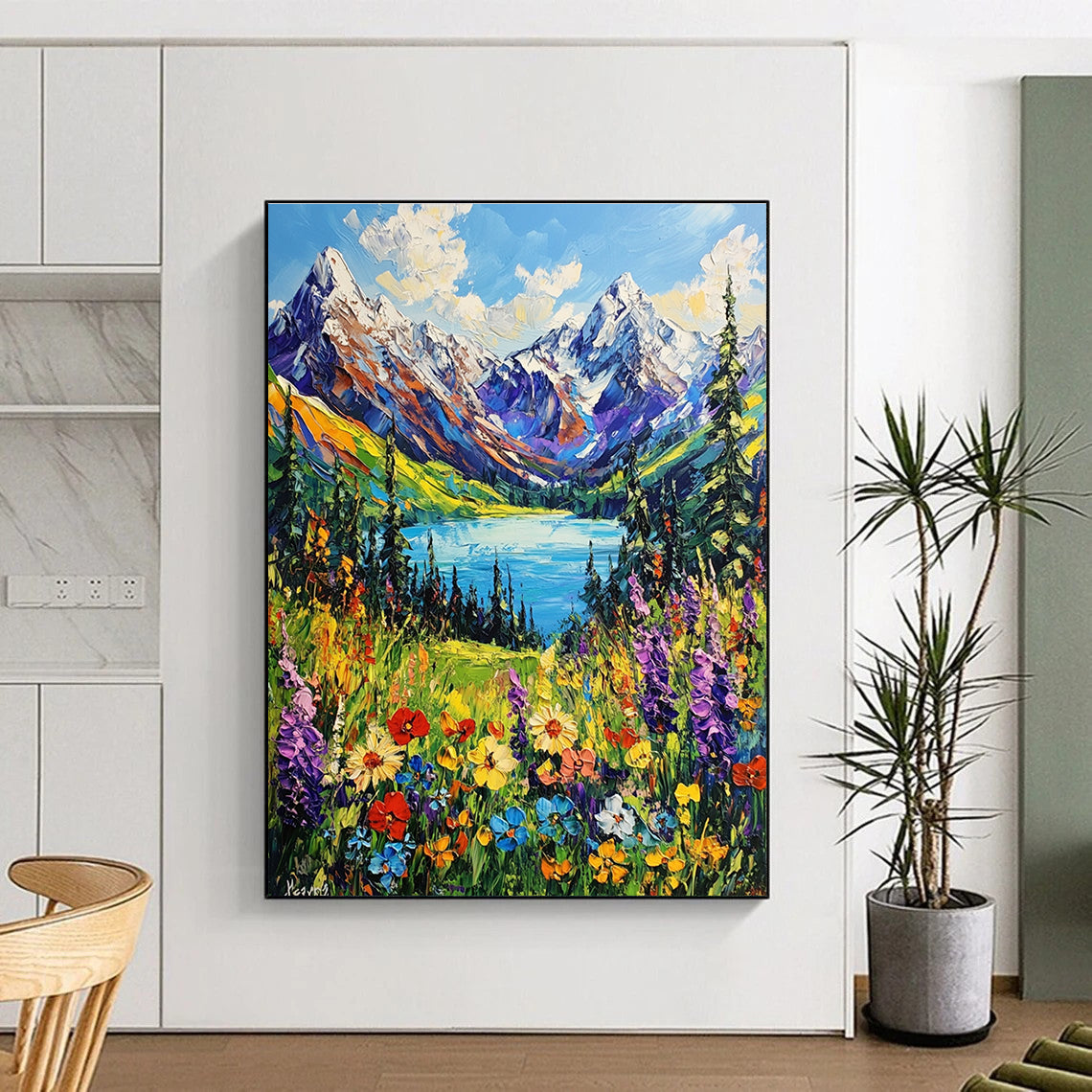 A large abstract painting capturing snow-capped mountains vibrant wildflowers and a serene blue lake in British Columbia's lush landscape in impressionistic style.STSC1225