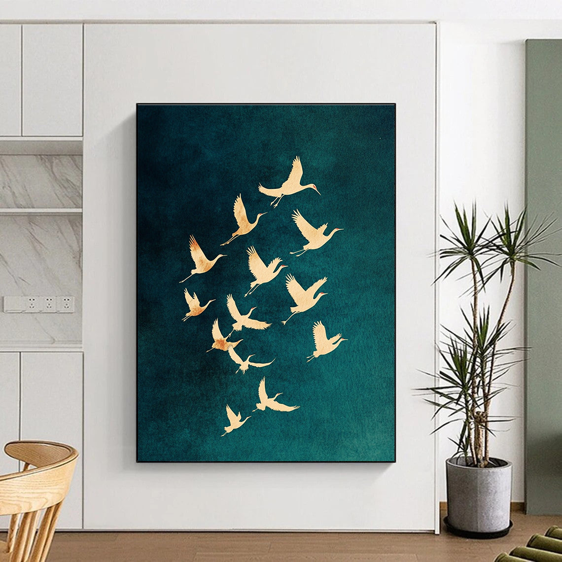 Large abstract painting featuring golden crane silhouettes on a dark blue-green background evoking mystery tranquility and freedom in nature.STSC1305