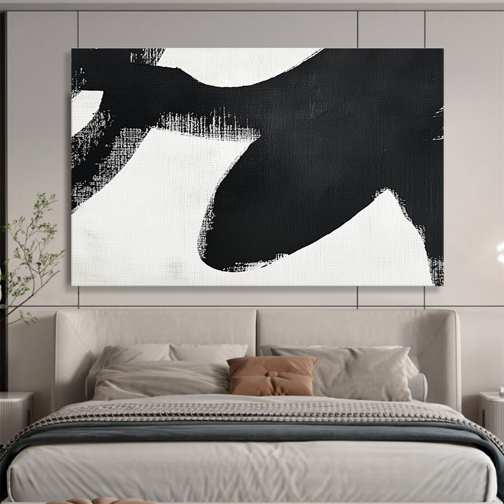 Large abstract painting in black and white featuring simple shapes and broad brush strokes inspired by an orca's tail flippers.SC016