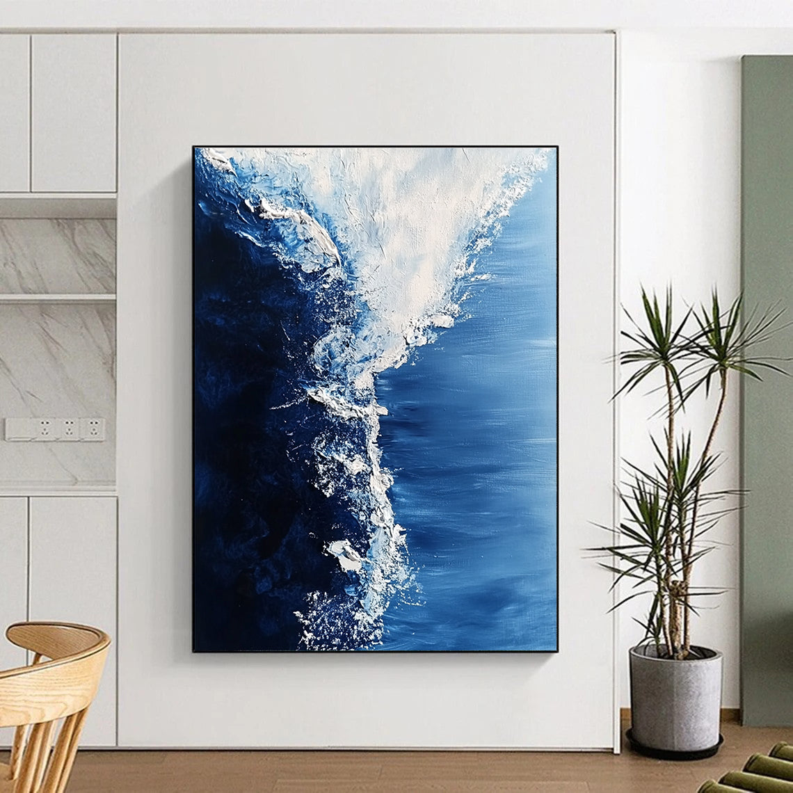 Large abstract painting of swirling Arctic sea in white and blue tones features visible brush strokes and snow crystal details for a hyper-realistic effect.STSC348