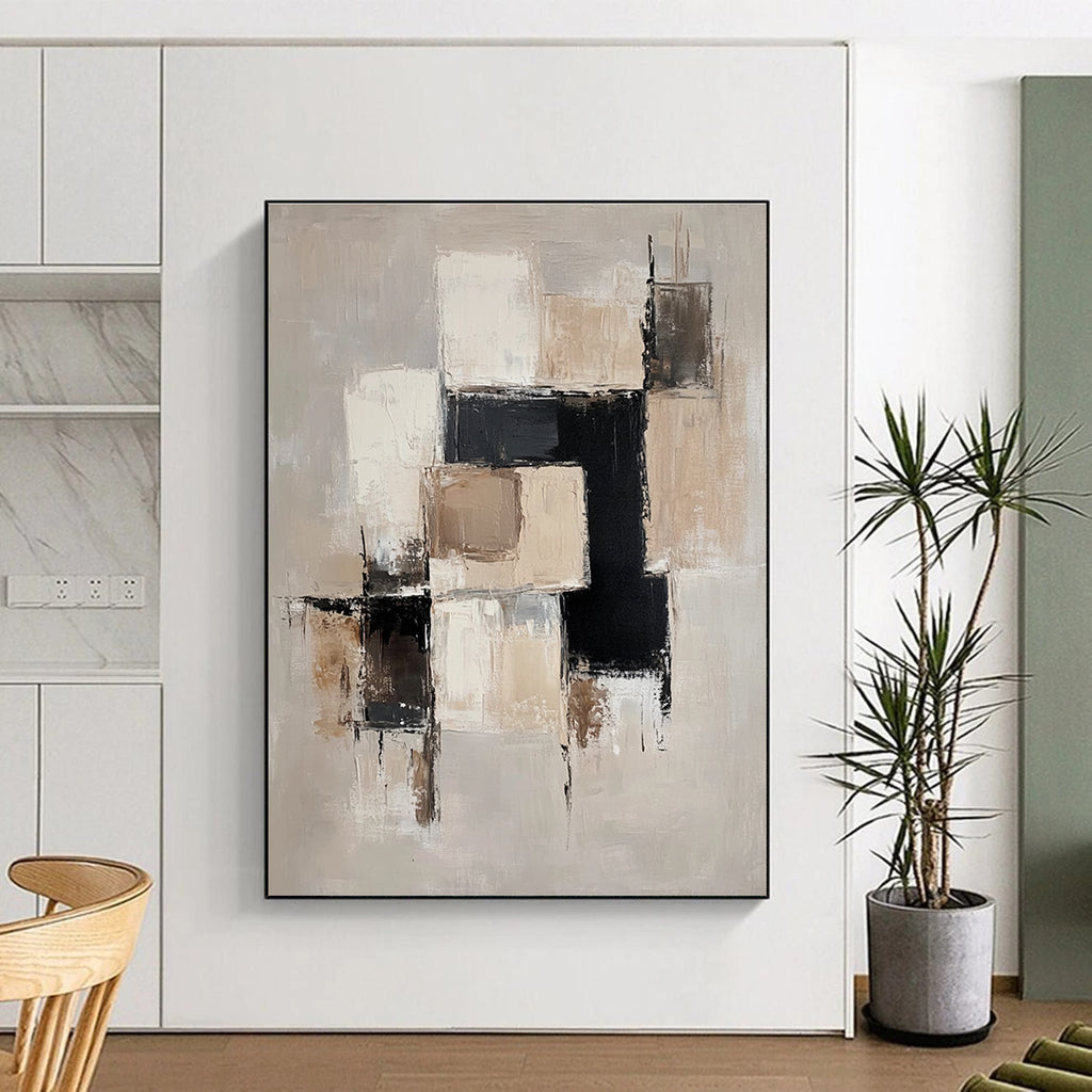 Large abstract painting with beige and white blocks black accents and soft edges on a light gray background creating an elegant minimalist feel.STSC220