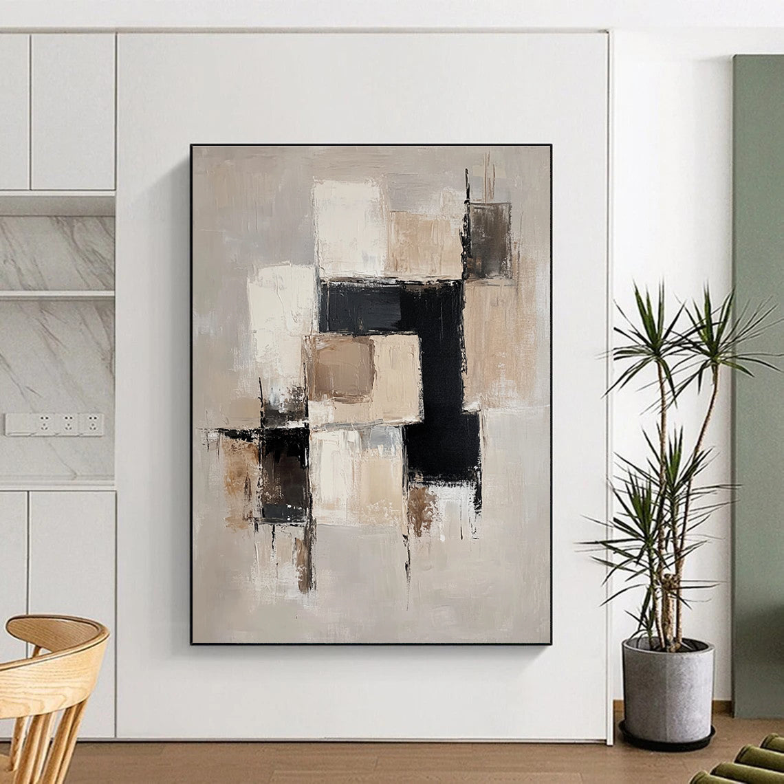 Large abstract painting with beige and white blocks black accents and soft edges on a light gray background creating an elegant minimalist feel.STSC220