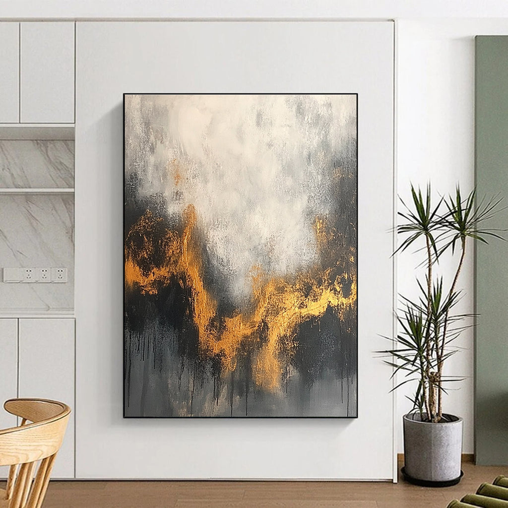 Large abstract painting with a gray and white background accentuated by gold tones and dark colors for an atmospheric effect.STSC394