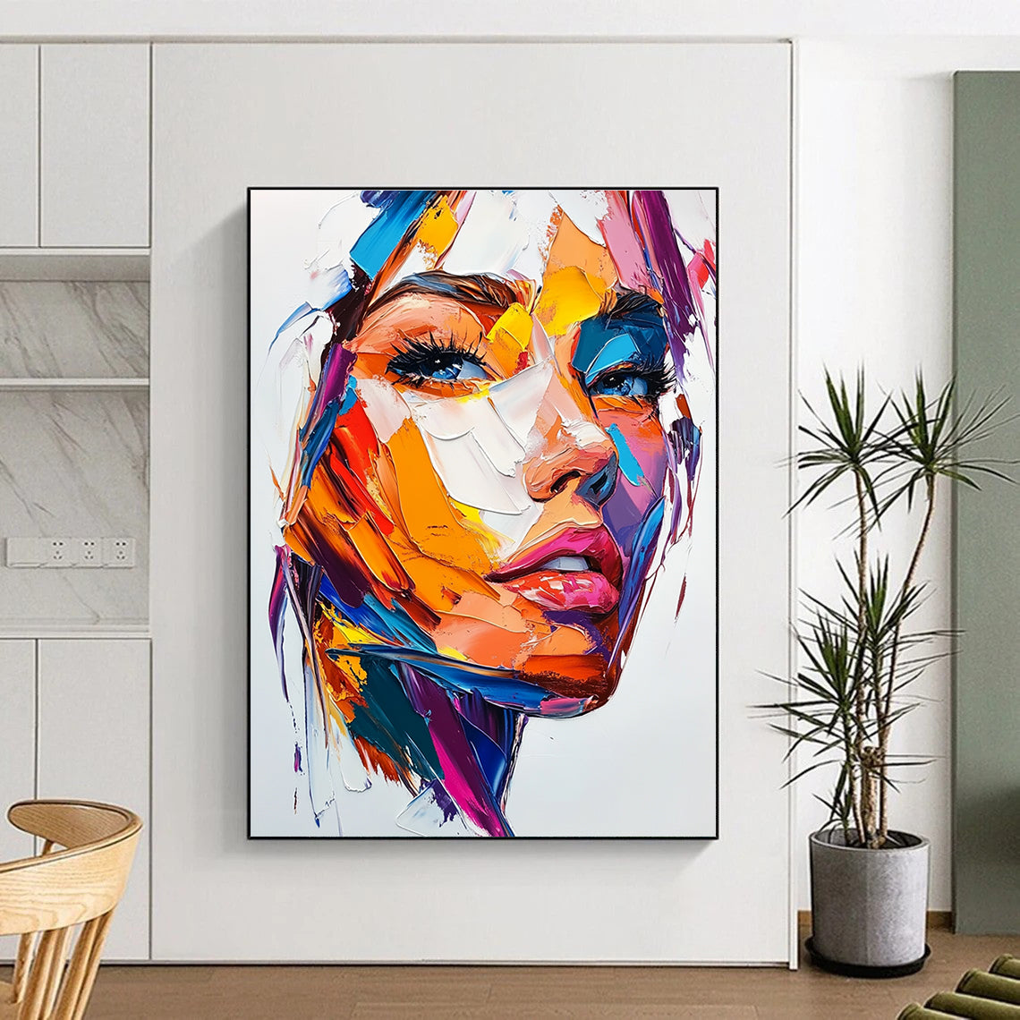 Large abstract painting of a woman's face featuring vibrant colors bold brush strokes and intense emotion on a white background.STSC457