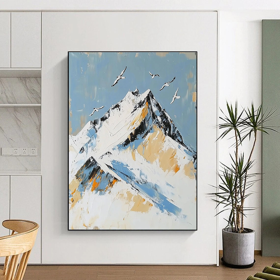 Large Abstract Painting featuring Snowy Mountain Peak with Birds in Flight accented with Gold in Elegant White and Blue Tones.STSC1365