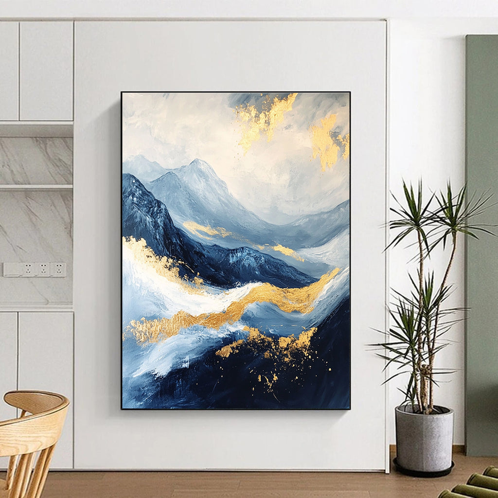 Abstract Blue and Gold Mountain Landscape Painting featuring a white sky, golden waves, dark blue clouds, and black rocks beautifully detailed.STSC030