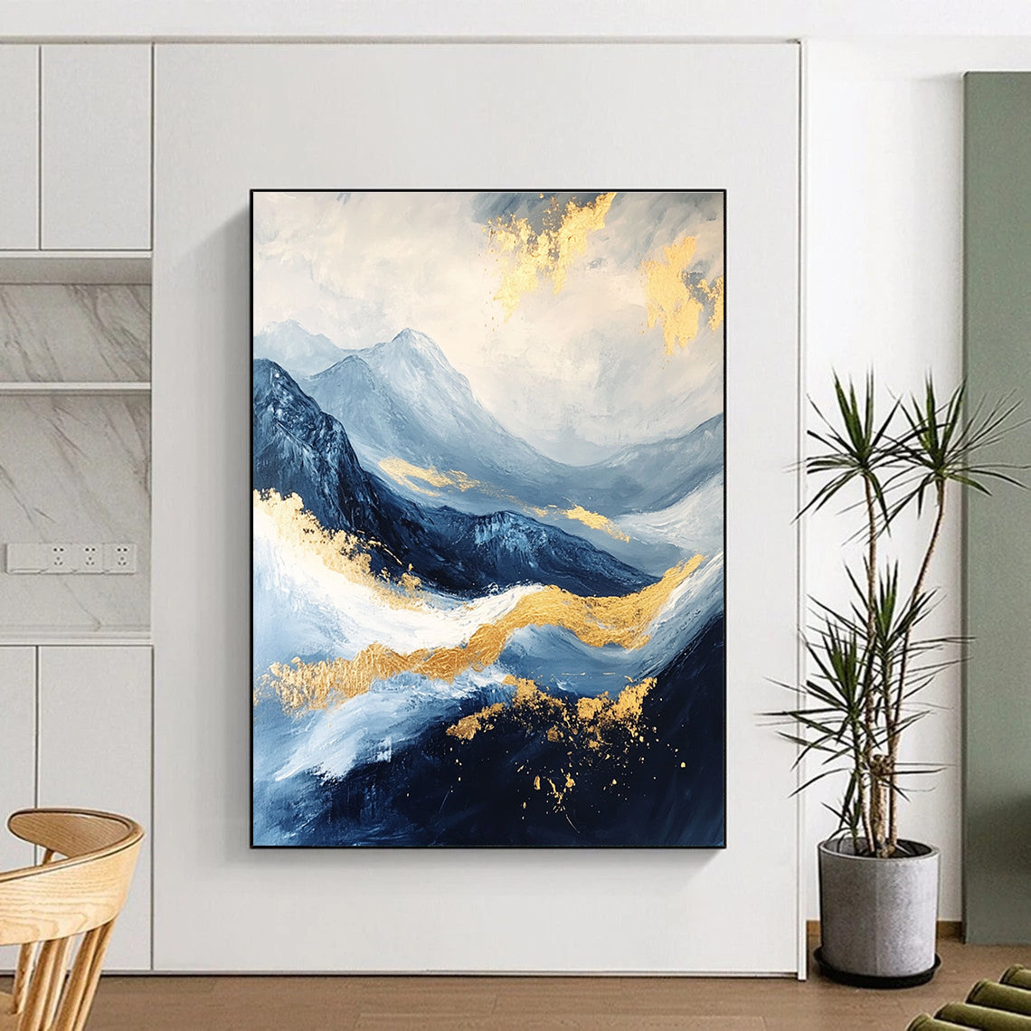 Abstract Blue and Gold Mountain Landscape Painting featuring a white sky, golden waves, dark blue clouds, and black rocks beautifully detailed.STSC030