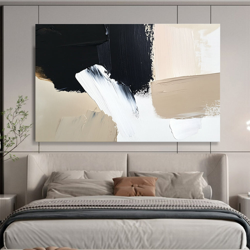Large abstract painting featuring black brush strokes on a white background complemented by a minimalist beige and cream color palette.SC012