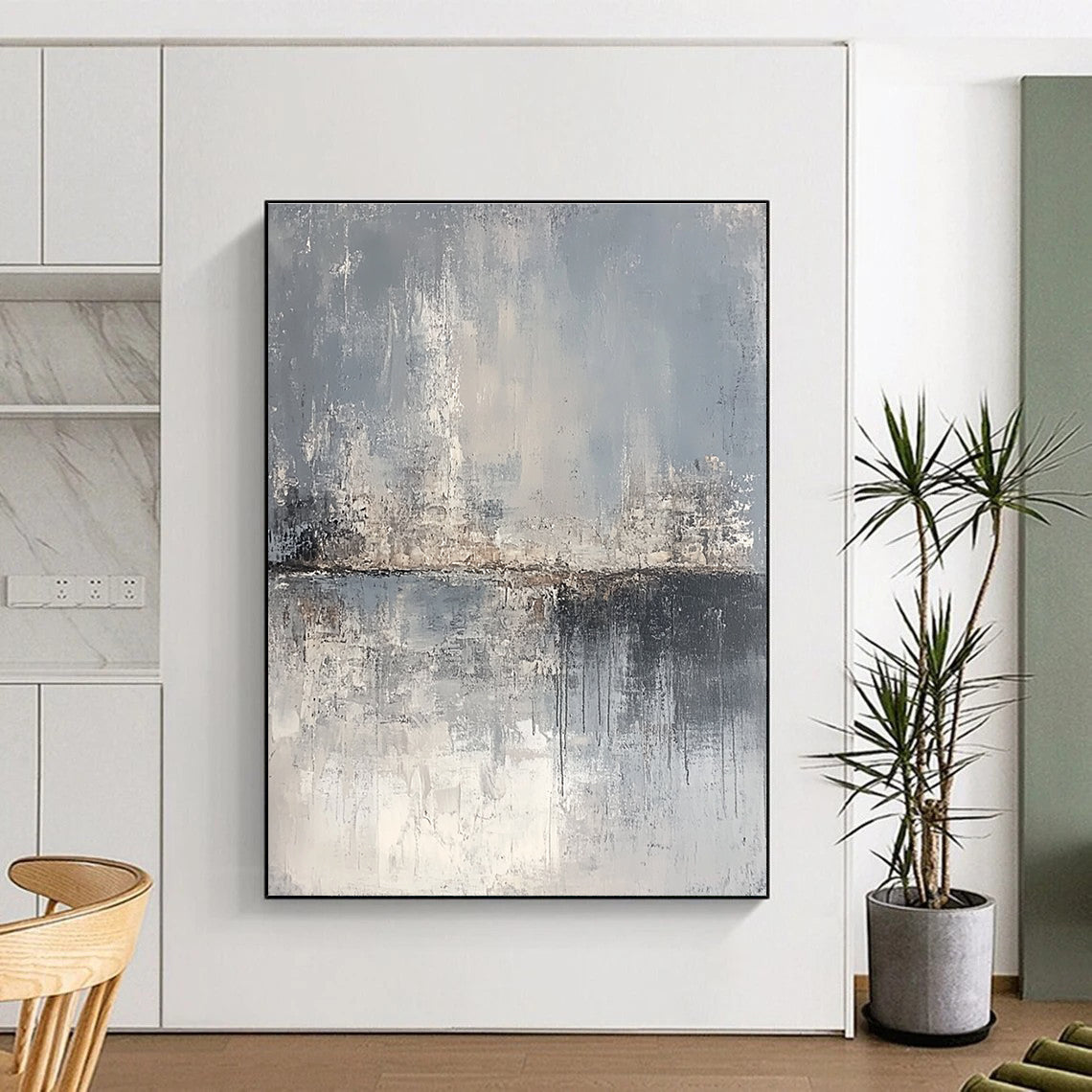 Large abstract painting depicting a serene landscape in gray and beige tones, featuring canvas texture and an atmospheric quality.STSC063