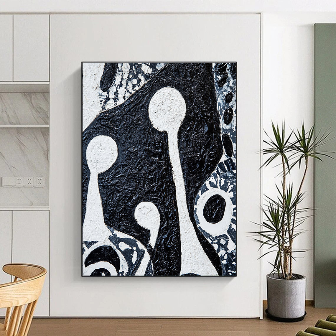 Large abstract painting featuring bold black and white patterns with tribal art elements and two figures holding musical instruments on textured canvas.STSC937