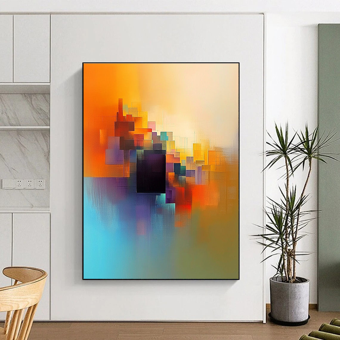 Large abstract painting featuring light orange blue and yellow colors with a serene cityscape and a central dark brown cube.STSC687