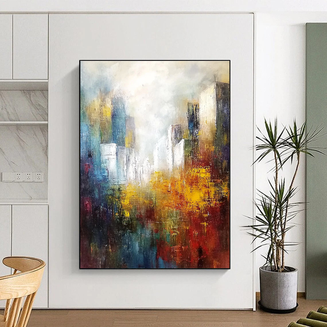 Large abstract landscape painting featuring white buildings in the distance with soft edges and muted tones in a light sky blue and dark amber palette.STSC106