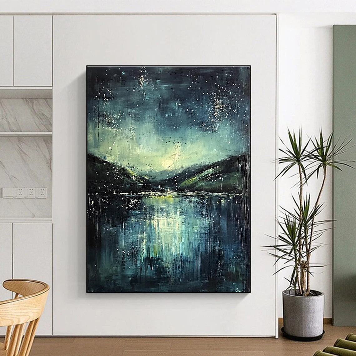 Abstract painting featuring a misty night sky with stars a serene lake and green hills in dark blue and teal hues.STSC294