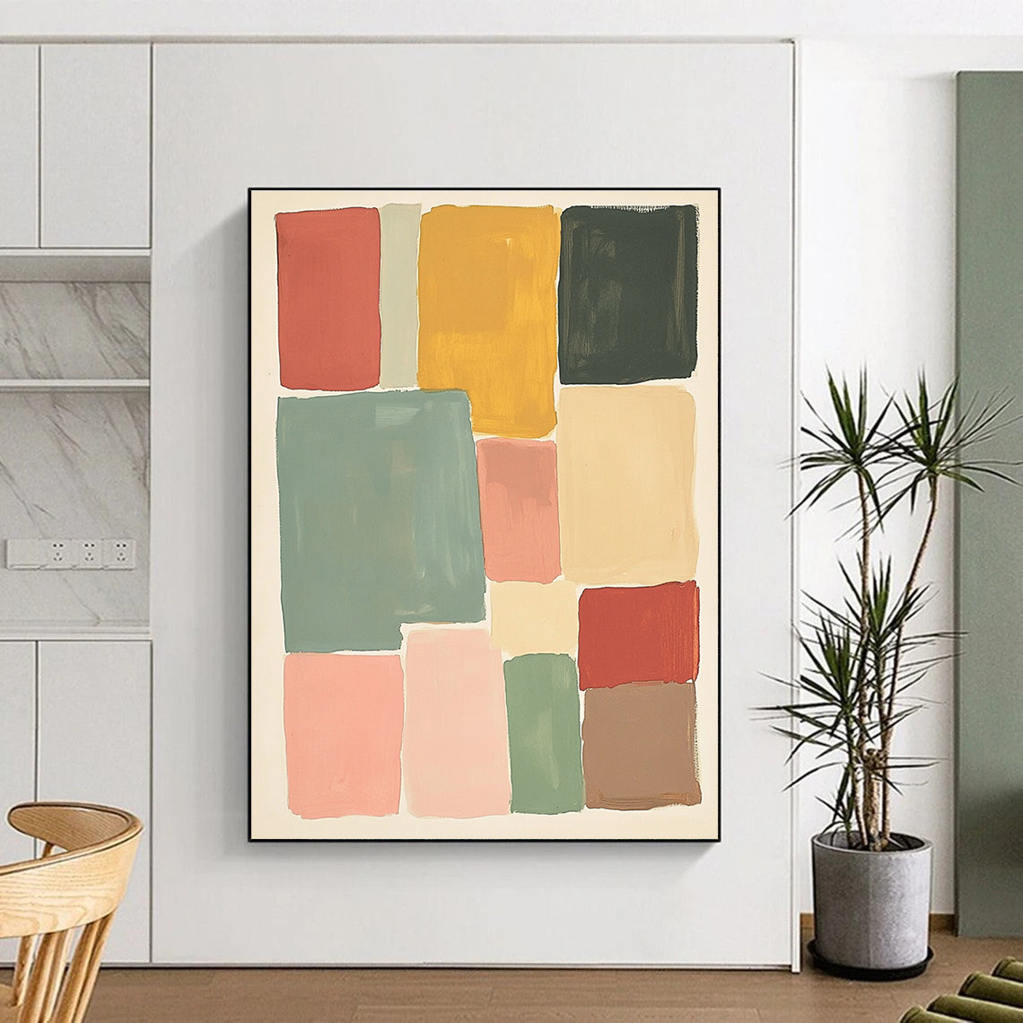 Large abstract painting featuring muted colors and soft hues in thick block shapes of sage green pink red and yellow against a white background.STSC1361