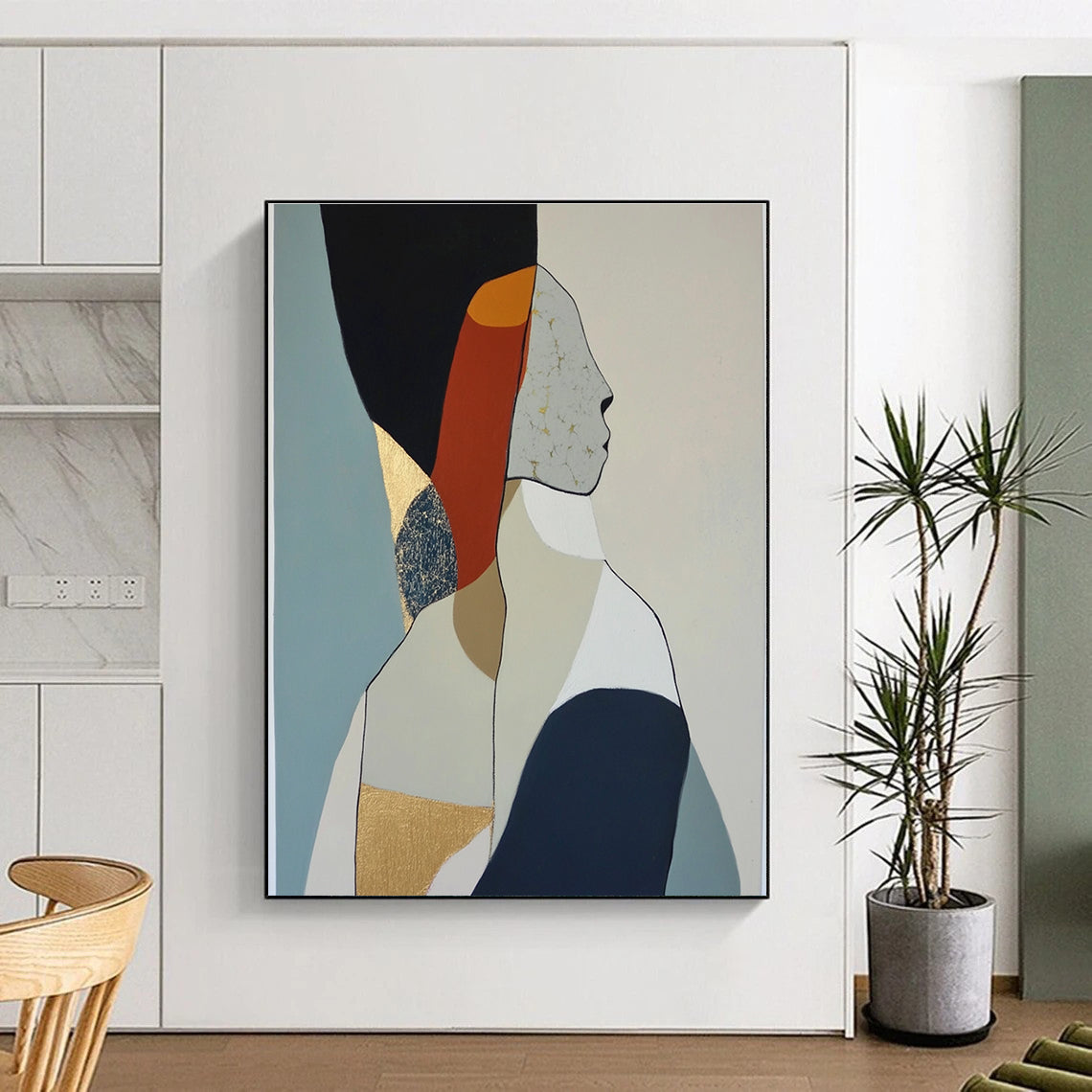 Large abstract oil painting featuring minimalist woman body shapes in muted colors with visible brush strokes and gold leaf accents.STSC1064
