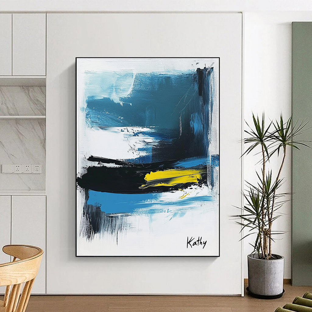 Large abstract painting of the sea featuring blue black and white brush strokes with yellow accents signed by Kathy.STSC1423