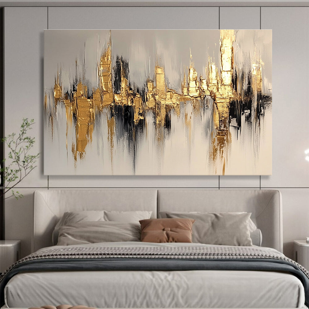 Large abstract painting of a cityscape in gold and white, featuring bold brush strokes on a white background with neutral tones.SC170