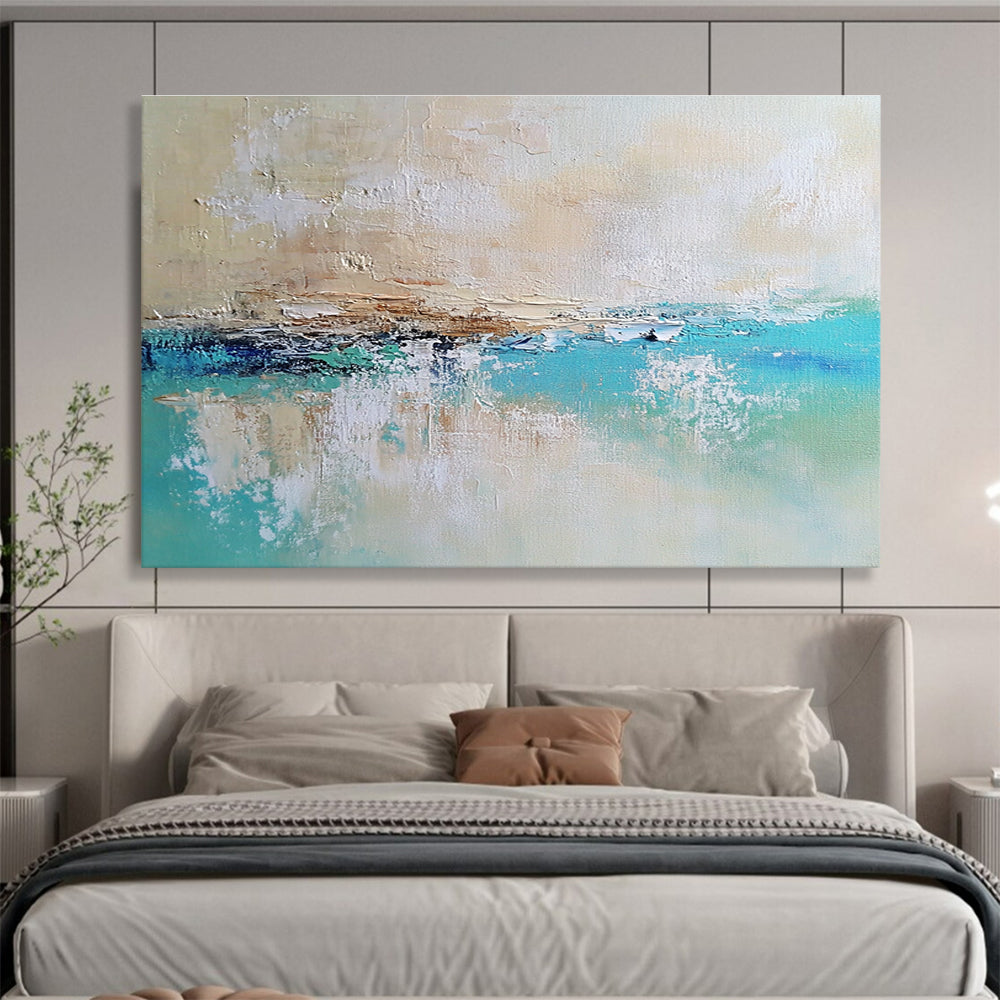 Large abstract painting of a calm sea featuring blue and green tones on a textured canvas with soft edges and neutral colors.SC340