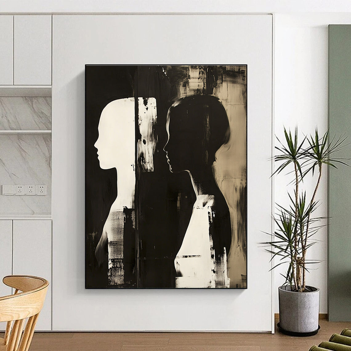 Large abstract painting featuring two profile figures in contrasting tones against a dark monochrome background.STSC1448