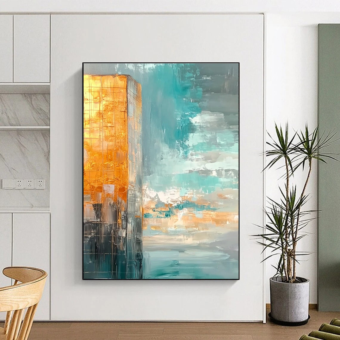 Large abstract painting featuring muted teal and gold tones with a vast sky clouds and calm water creating a serene atmosphere.STSC090