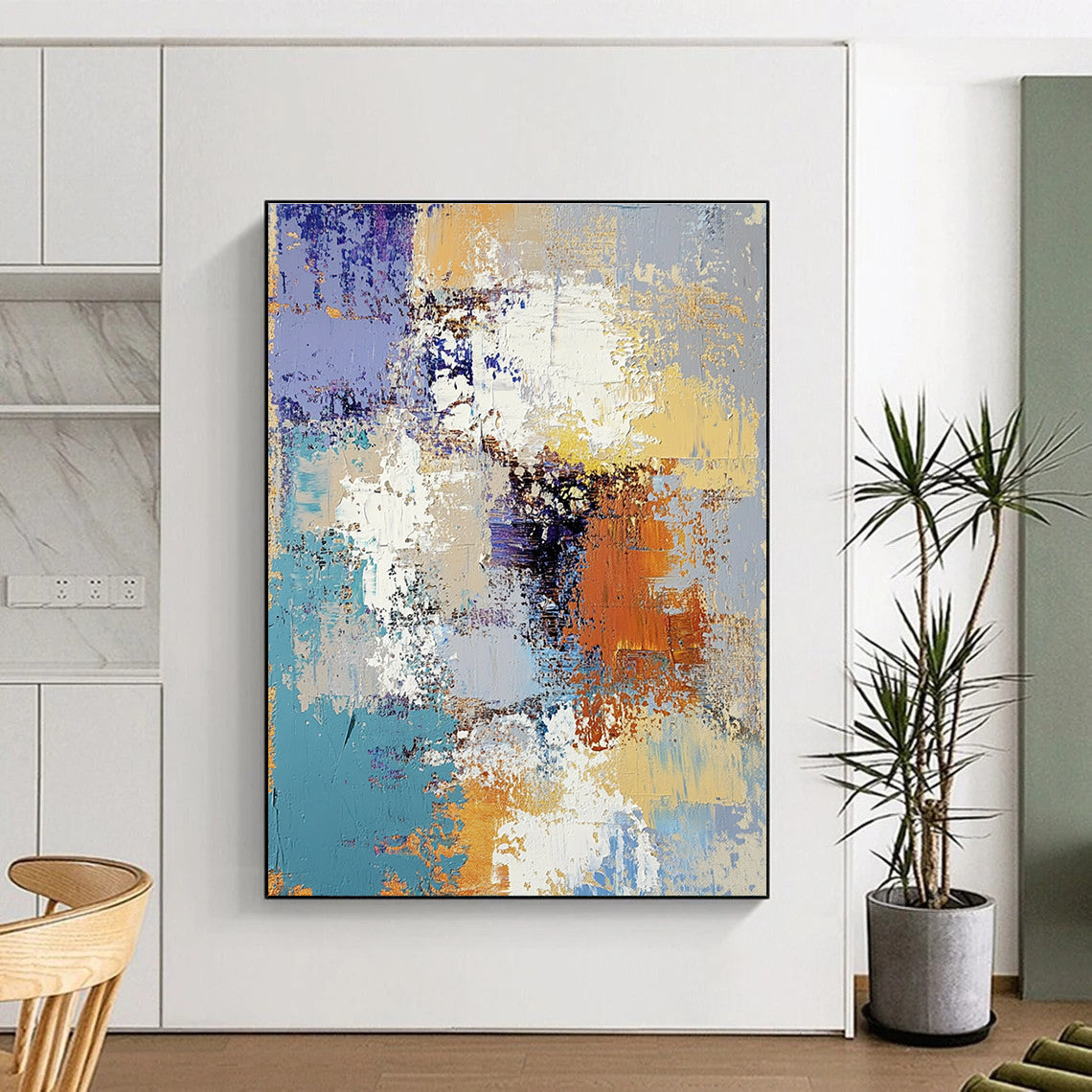 Large abstract oil painting featuring textured layers of blue yellow white gray beige and brown with intricate patterns and emotional depth.STSC584