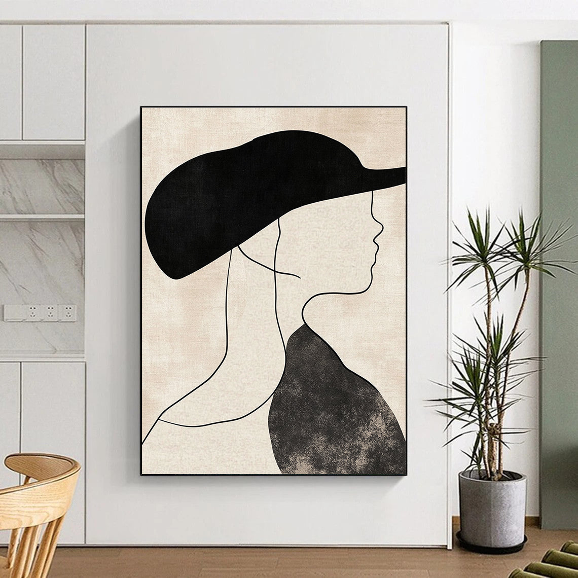 Abstract art depicting a woman's profile in a hat with neutral shapes thick lines and a beige background in black and white tones.STSC1333
