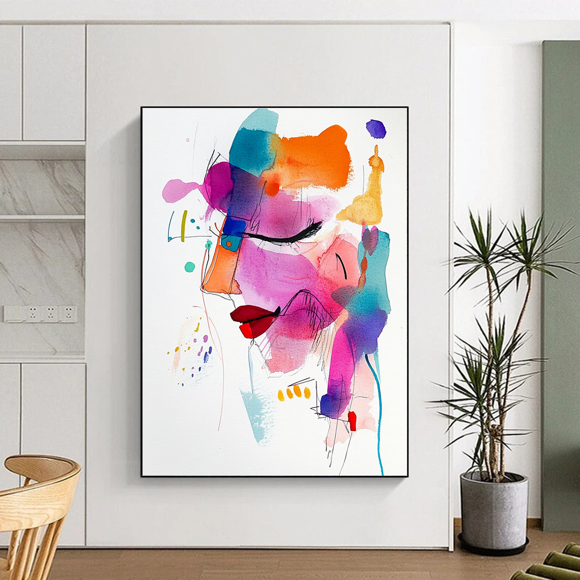 A large abstract painting featuring vibrant colors and loose brushstrokes, highlighting a whimsical face in a contemporary minimalist style.STSC1194