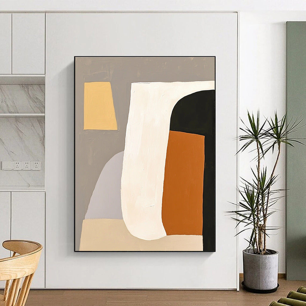 Large abstract painting featuring white shapes with an orange and black form against a grey background embodying minimalism and elegance.STSC628