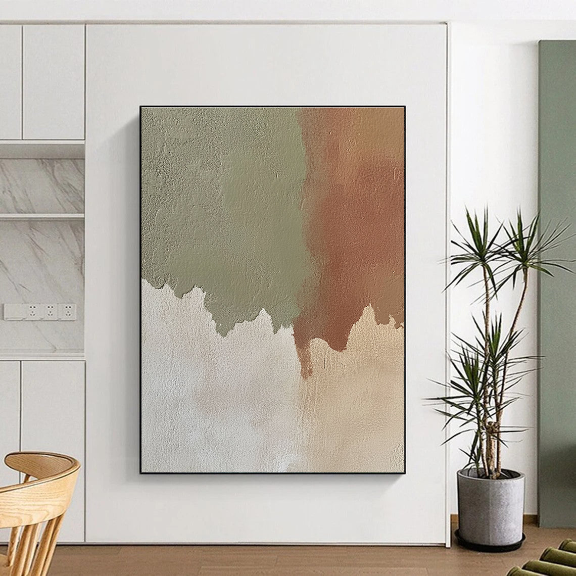 Abstract hand-painted artwork featuring beige paint with green shadows and reddish-brown shapes showcasing neutral tones and subtle color contrast.STSC488