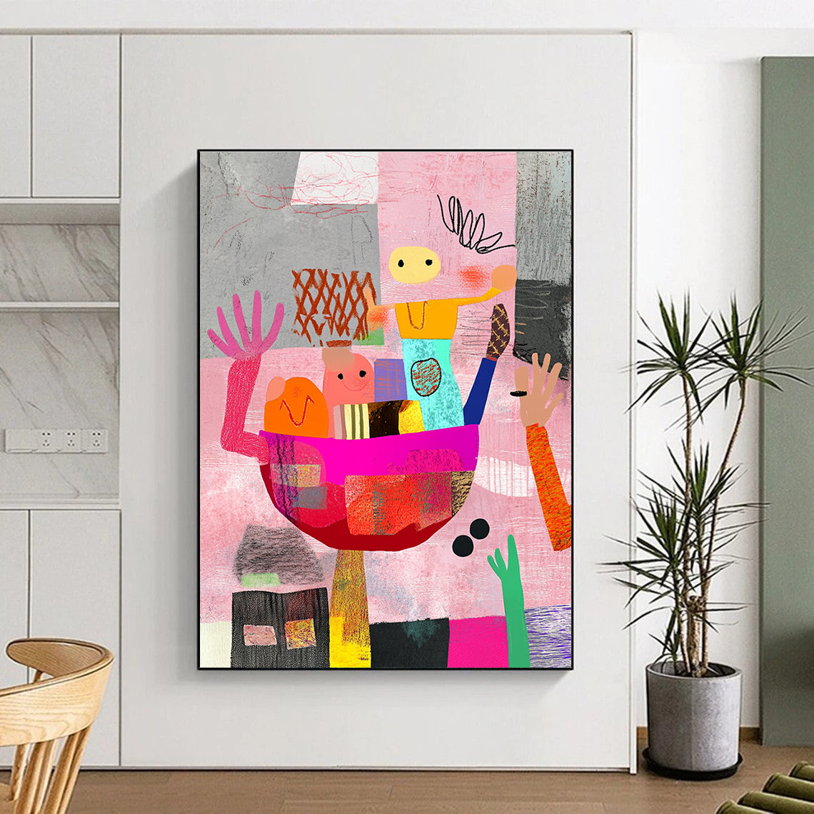 Large abstract artwork featuring whimsical shapes and people carrying an oversized food bowl against a pink and gray backdrop with colorful hand-drawn patterns.STSC968