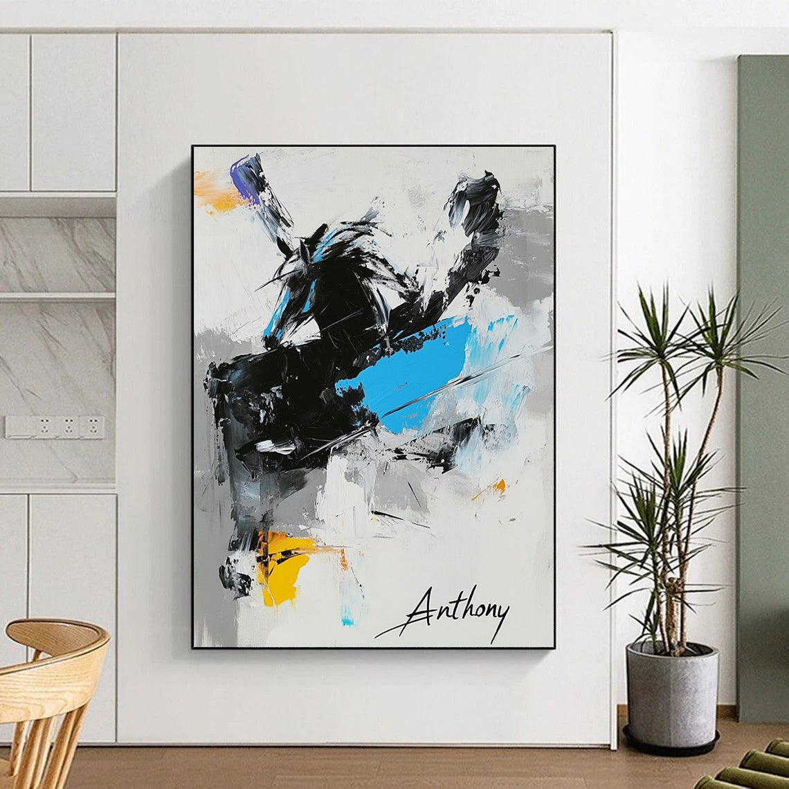 Large abstract painting featuring "Anthony" in black white and blue with a dynamic horse and signature Michael in the corner.STSC349