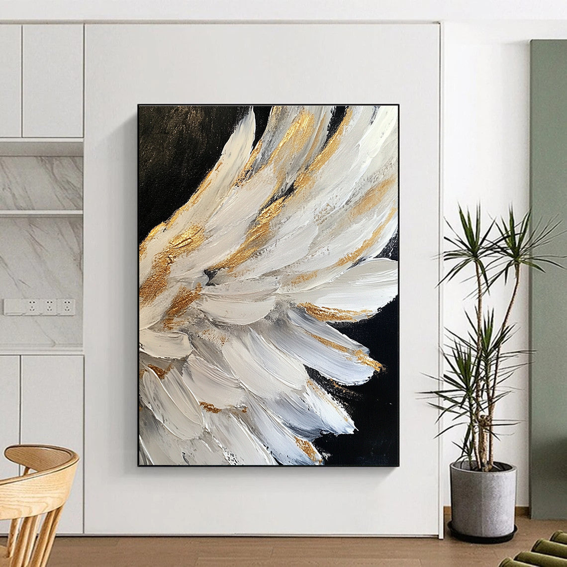 Large abstract painting of white angel wings with gold accents on a black background featuring heavy brush strokes and palette knife work.STSC006