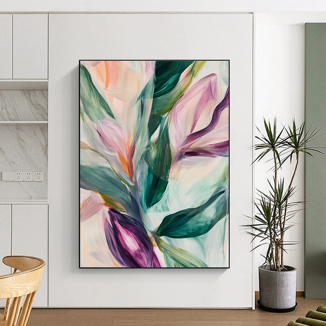 Large abstract painting featuring soft pastel leaves and flowers in neutral tones set against a blurred white background.STSC314