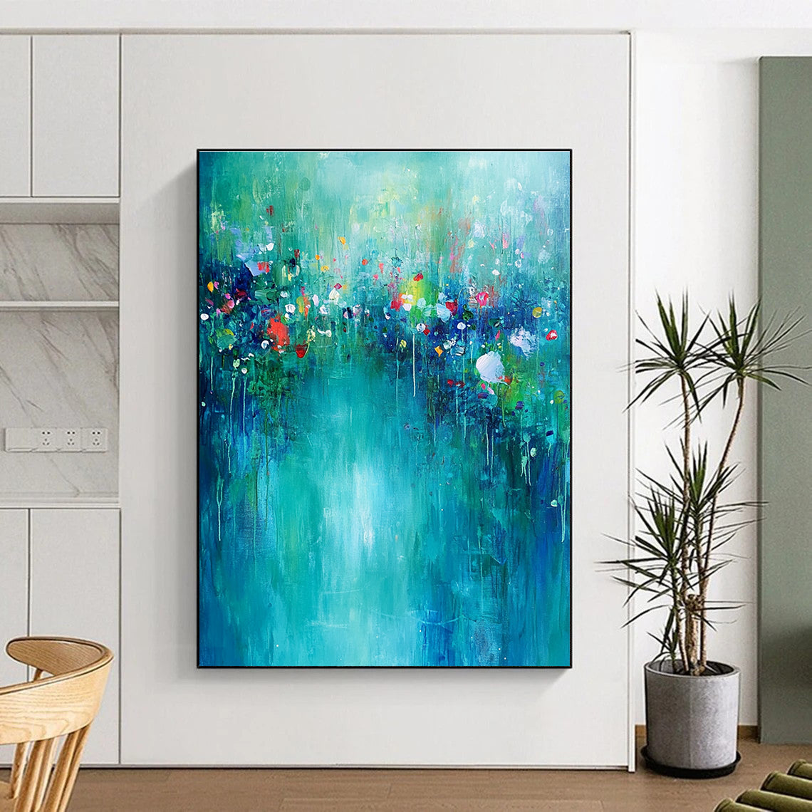 Large abstract painting of an underwater garden featuring vibrant greens and blues with small flowers on a soft turquoise background, evoking calm and tranquility.STSC274